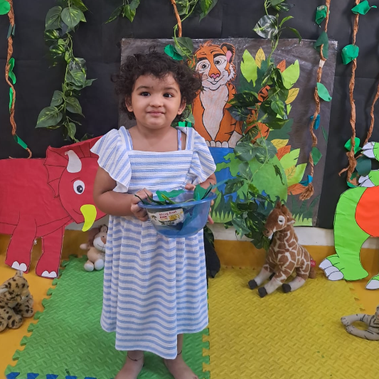 Child exploring in a jungle-themed classroom